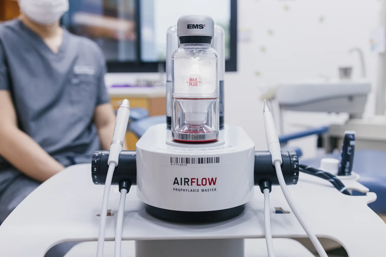 Close-up of the AIRFLOW unit used for Guided Biofilm Therapy in the treatment room